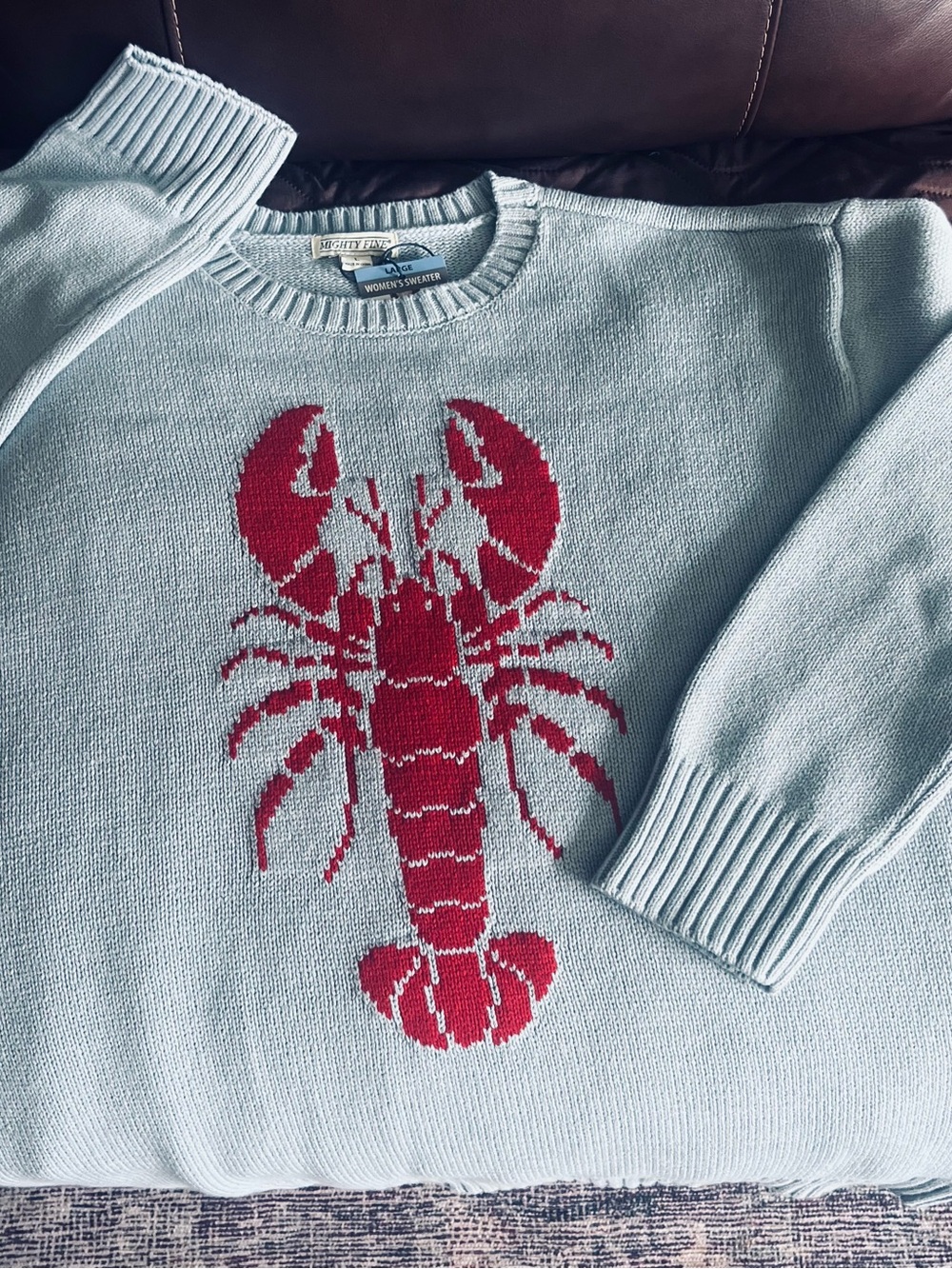 Women’s Mighty Fine Light Blue Crewneck Sweater with Red Lobster Motif. Size L